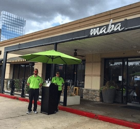 Age Executive Valet with a Compact Podium in front of Maba Asian restaurant in Houston TX