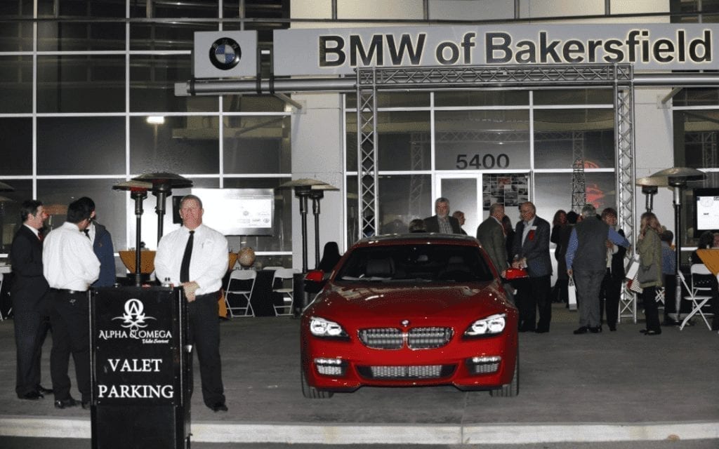 Alpha Omega Valet Service with portable podium at BMW Bakersfield